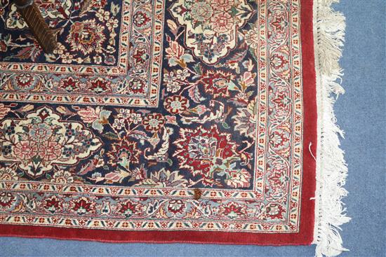 A large Persian carpet, 366 x 277cm (a.f.)